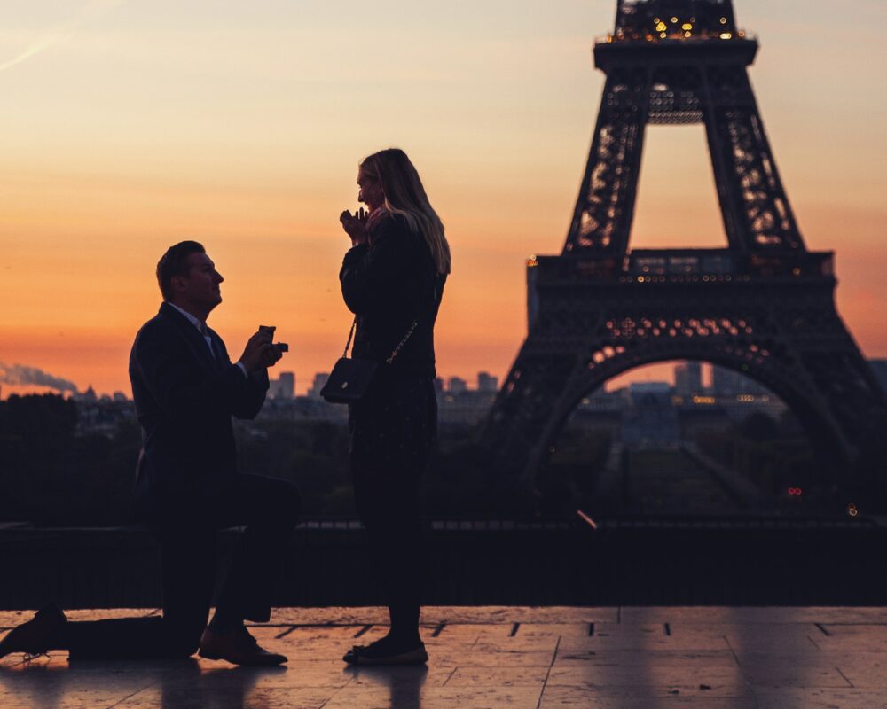 Surprise proposal & engagement photo session in Paris, France by photographer Marie Calfopoulos