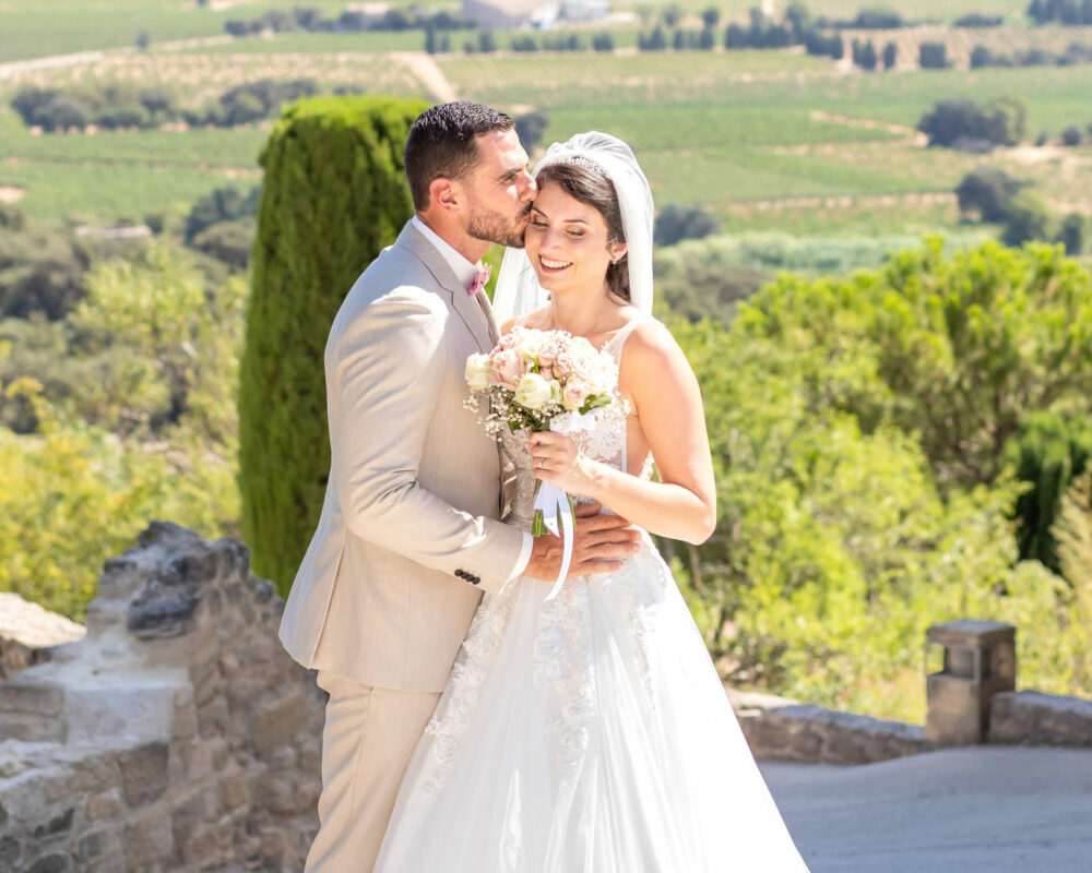 Bride & Groom portrait photo session on their wedding in Chateauneuf du Pape, Provence, France by photographer Marie Calfopoulos